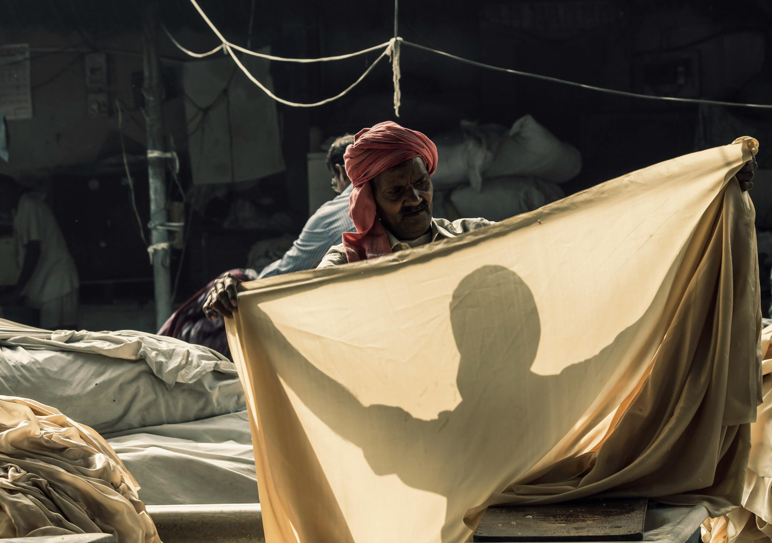 Man Holding Brown Textile